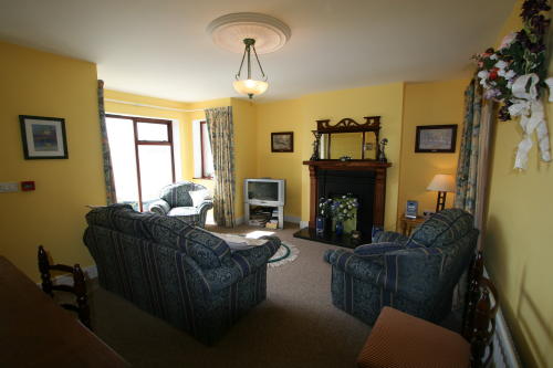 Glencloy Lounge and dining area with panoramic sea views